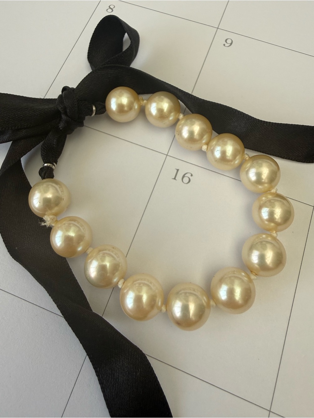 Ivory Pearl Bead Bracelet with Black Ribbon Tie